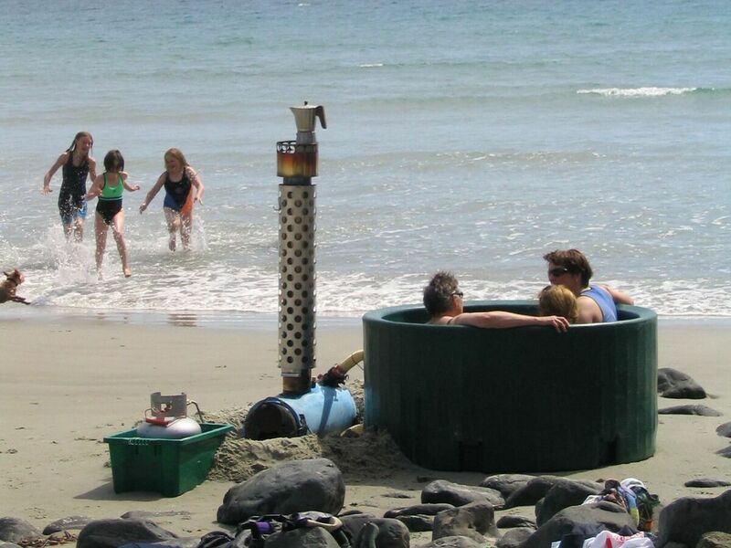 Tub at the beach with kids and dog